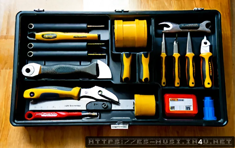 기타 도구 및 키트 - Photorealistic overhead view of a neatly organized household repair toolkit on a light wood workbenc...